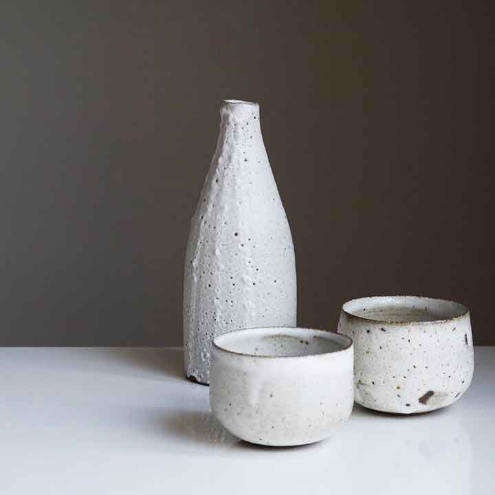 Image of three lovely white pots